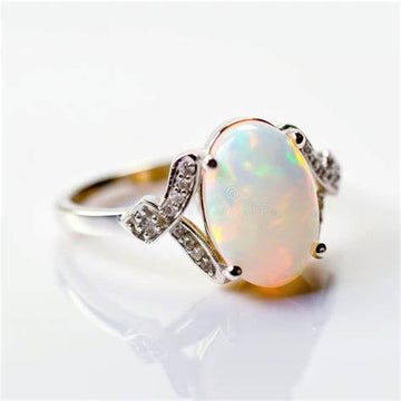 Opal Ring Guide: Play-of-Color, Symbolism & Delicate Elegance - Prestige Stones