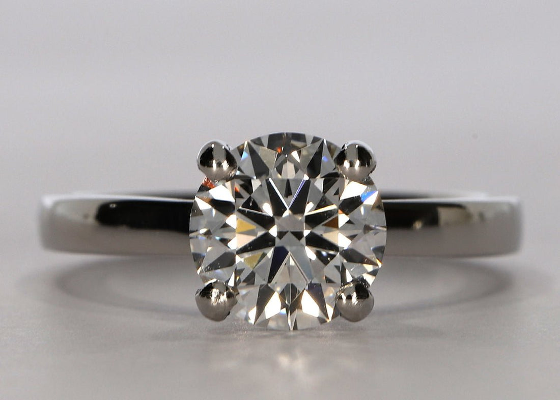 1477 Classic ring in Platinum set with a Round 1.31ct E - Extremely White VVS2 - Lab - grown Diamond. The diamond sits proudly on a flat band with a band width of approximately 2mm - Prestige Stones