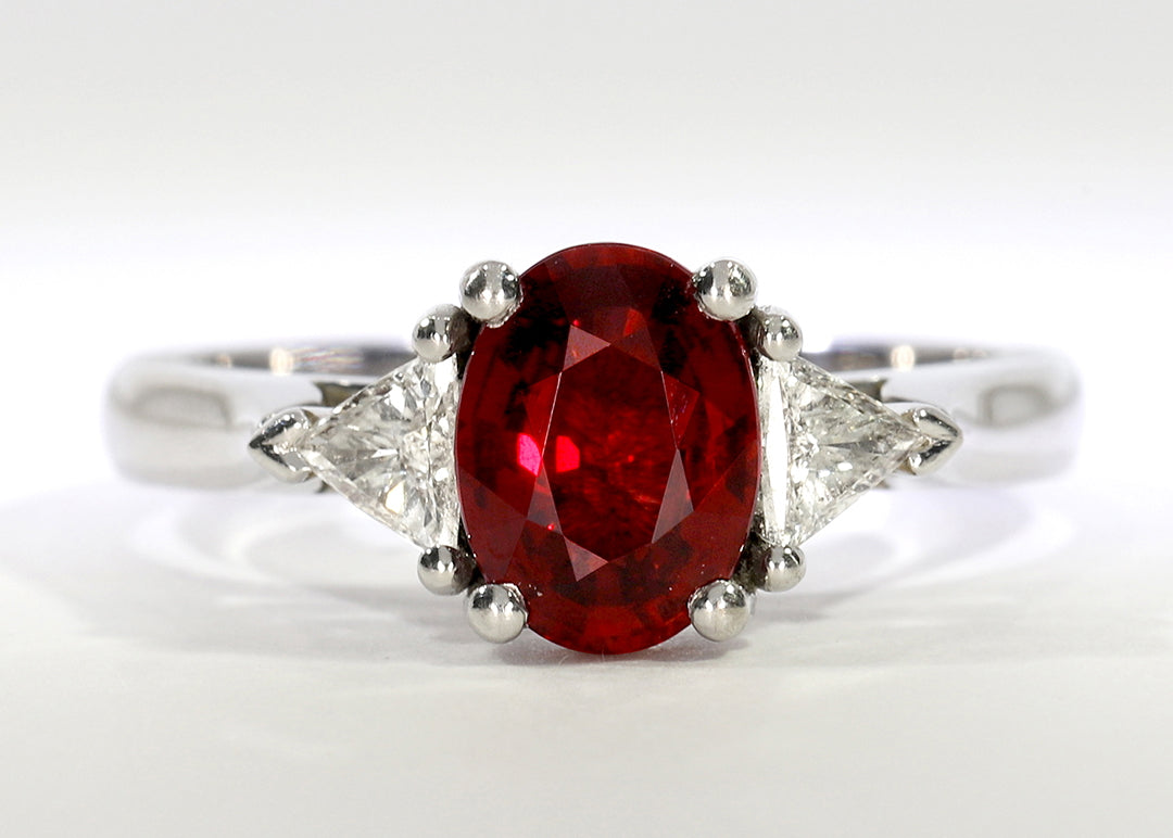 Paris ring in White Gold set with a Oval 1.35ct. Red Eye Clean 1 Ruby. With a total carat weight of 0.19ct and a 2.0mm tapered band. Keep in mind this design is only suitable for a central diamond above 0.50 ct.