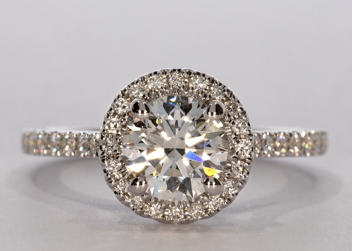 Aphrodite ring in White Gold set with a Round 1.10ct D - Perfectly White VS1 - Lab - grown Diamond. Set with Round cut sparkling diamonds for a total weight of approx 0.37ct. This delicate micro set ring has a 1.6mm wide band. - Prestige Stones