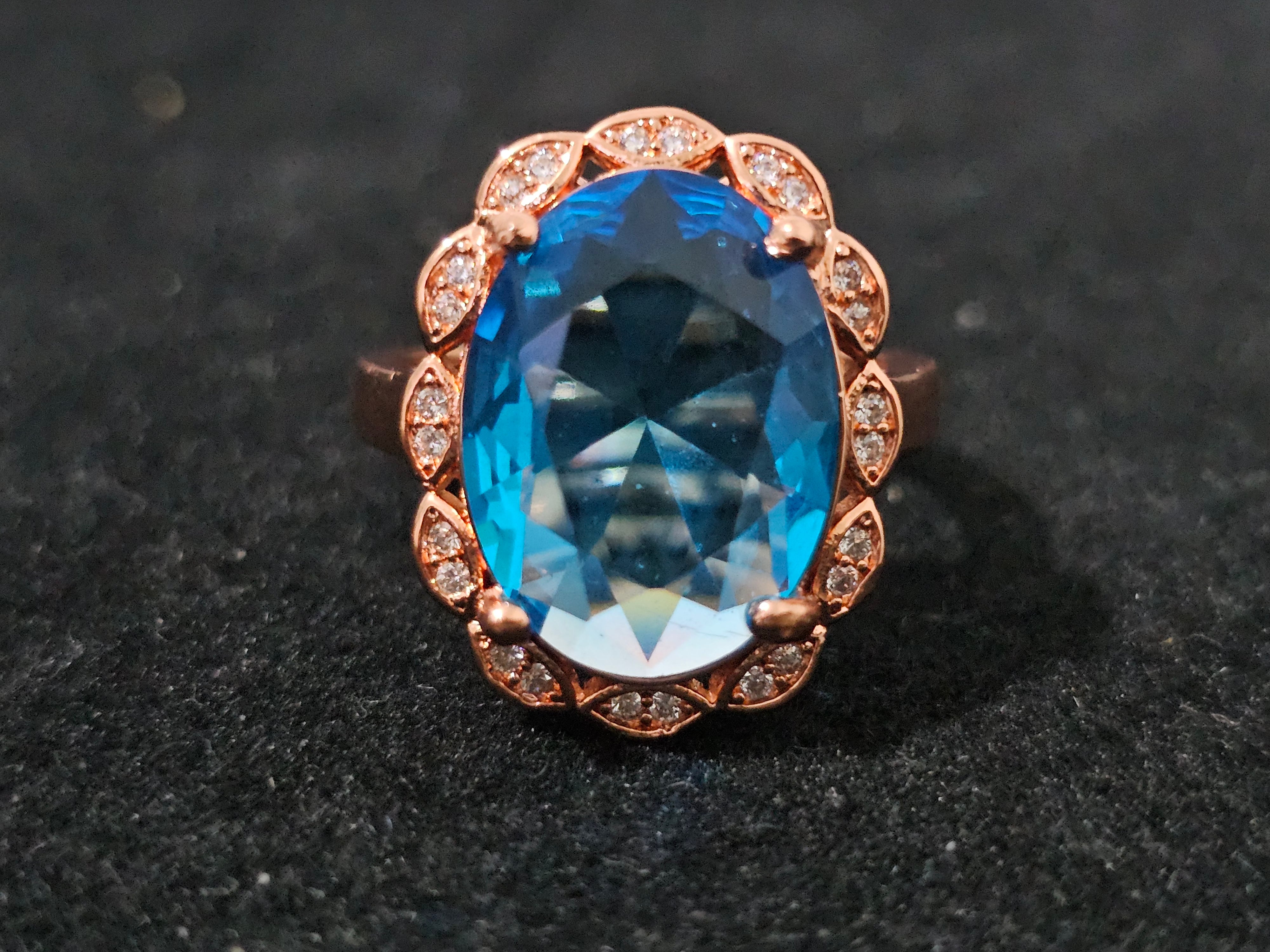 Blue gemstone ring with 18K rose gold-plated finish – adjustable size O to T, elegant and versatile for everyday or special occasions