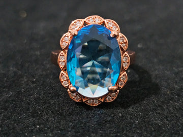 Blue gemstone ring with 18K rose gold-plated finish – adjustable size O to T, elegant and versatile for everyday or special occasions