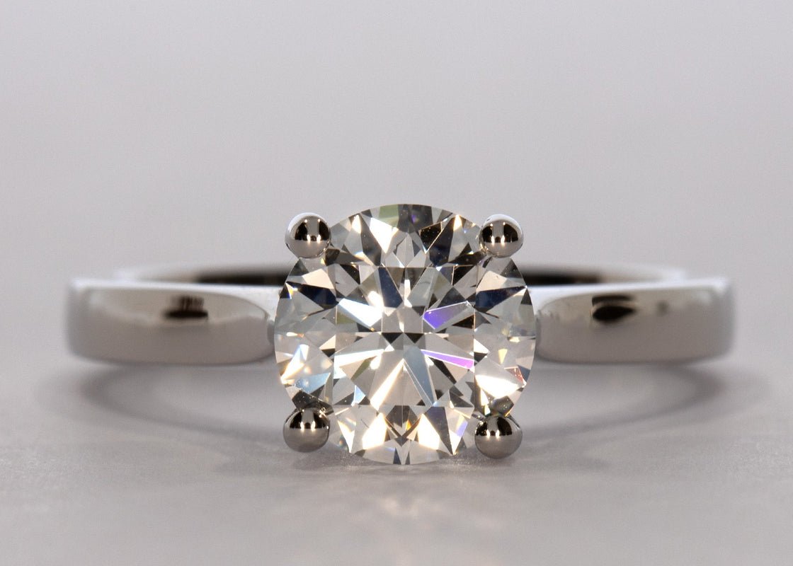 Contour ring in Platinum set with a Round 1.50ct D - Perfectly White VVS2 - Lab - grown Diamond. A stylish but traditional 2.2mm band that tapers which accentuates the beauty and size of the diamond. - Prestige Stones