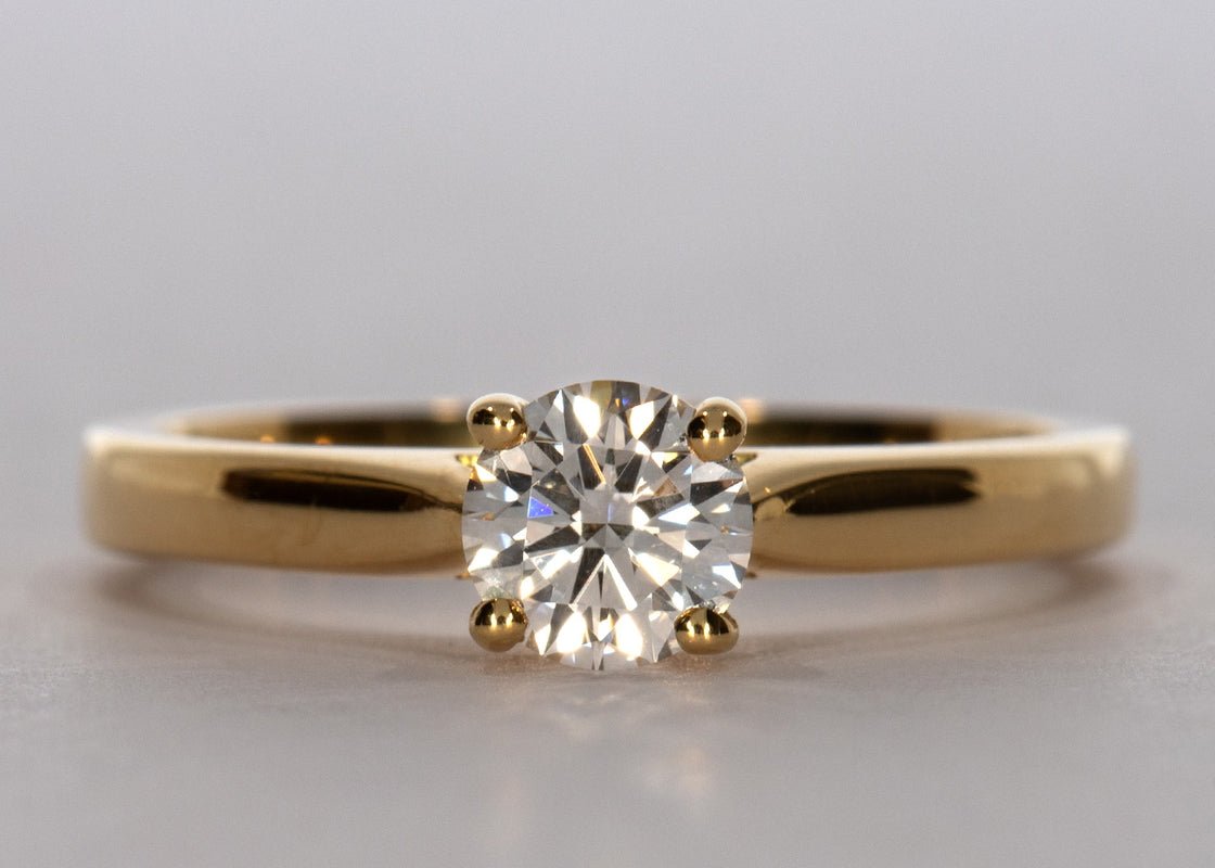Contour ring in Yellow Gold set with a Round 0.50ct D - Perfectly White SI1 - Lab - grown Diamond. A stylish 2.2mm band that tapers which accentuates the beauty and size of the diamond. - Prestige Stones