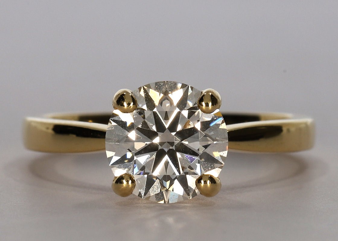 Delicacy ring in Yellow Gold set with a Round 1.40ct D - Perfectly White VVS2 - Lab - grown Diamond. Band width of approximately 2mm which tapers toward the diamond to enhance size and brilliance. - Prestige Stones