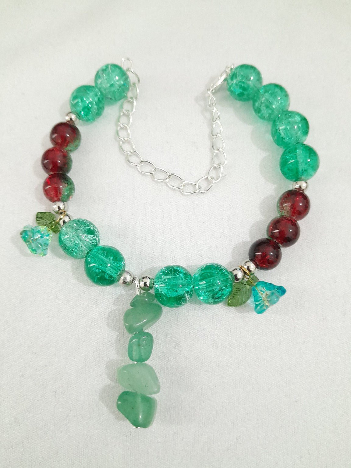 Green Crackle Glass & Red Bead Charm Bracelet - Prestige Stones