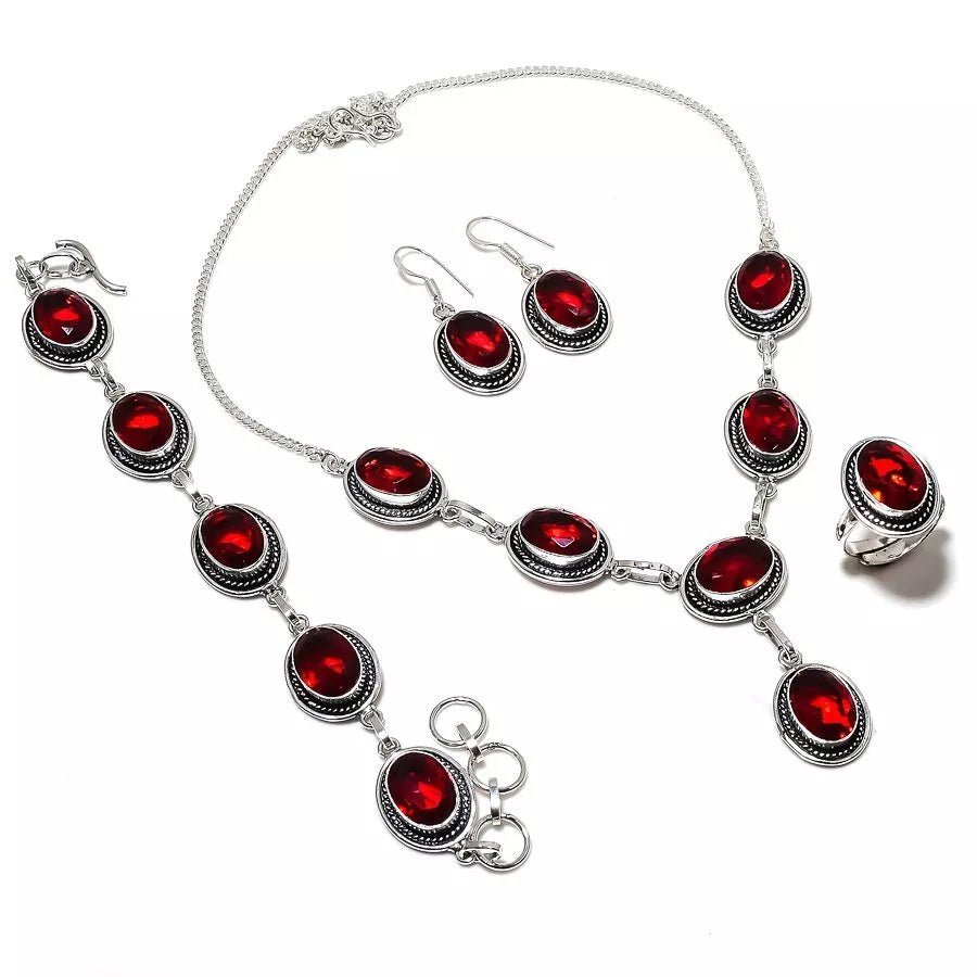 Mozambique lab-created garnet jewelry set in artisan handmade silver – necklace, earrings, bracelet, and ring