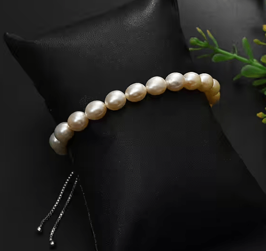 peach freshwater pearl bracelet with 50ct natural pearls set in 925 sterling silver, adjustable size