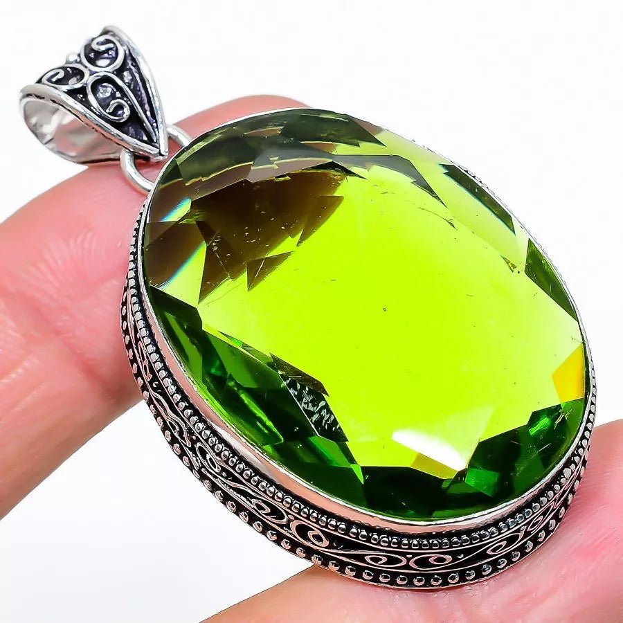 Handcrafted 925 silver pendant with lab-created peridot gemstone – ethnic-inspired design