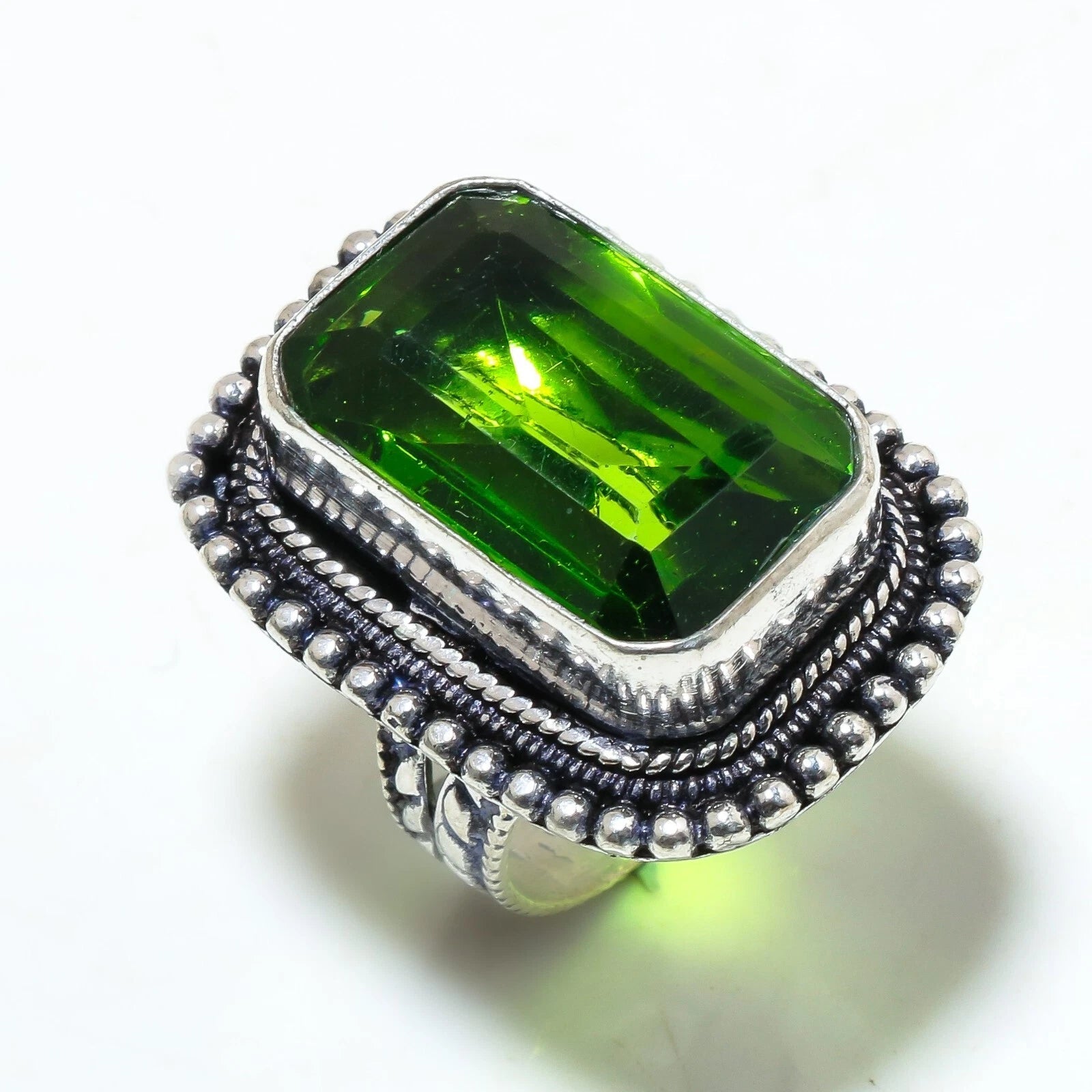Handcrafted 925 sterling silver ring with lab-created peridot gemstone – US size 7.5 / UK O, subtle ethnic-inspired design