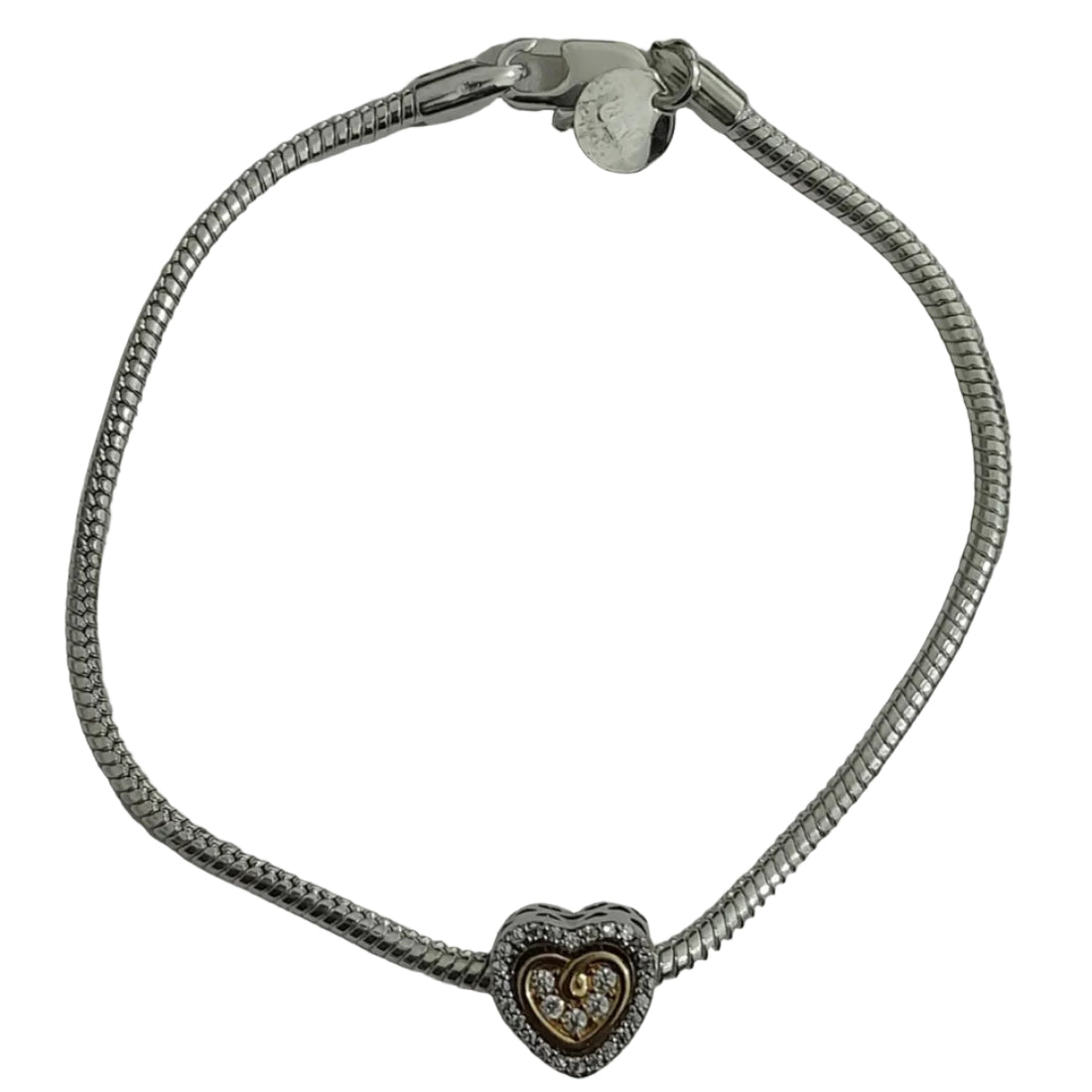 Two-tone heart charm bracelet with gold-tone inner heart, clear crystals, pavé accents, and polished snake chain