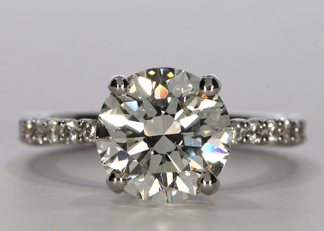 You have chosen the Duchess ring in Platinum set with a Round 2.51ct G - Very White VVS1 - Very Very Slightly Included Natural Diamond. A 2mm band, set with round brilliant diamonds for a total carat weight of approximately 0.28ct. - Prestige Stones